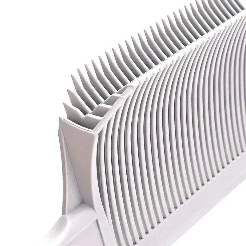 Close-up of a white barber fade comb hair cutting tool designed for precision fades and flat tops with gradient teeth and ergonomic grip.