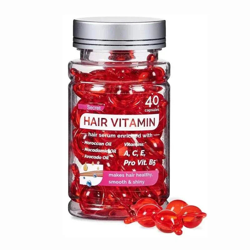 Bottle of Moroccan Agam Vitamin Oil Hair serum capsules enriched with vitamins A, C, E, and Pro Vit. B5 for healthy, smooth, and shiny hair.