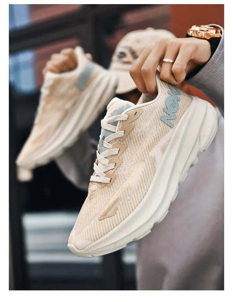 Lightweight beige Carbon Plate Air Cushion running shoes with breathable mesh upper and thick cushioned sole.