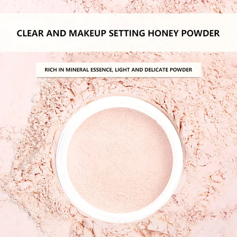 Gemeng Powder Makeup honey-toned setting powder in a white container with powder scattered around on a light pink background
