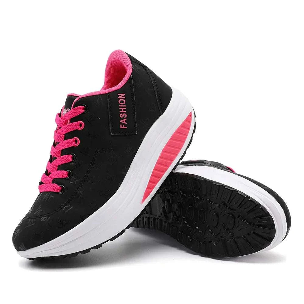 Black and pink breathable wedge heel sneakers for women with lace-up closure and cushioned sole for comfort and style