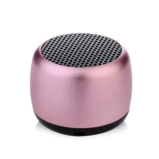 M1 Portable Bluetooth Speaker compact pink wireless speaker with 360° stereo surround sound and built-in microphone