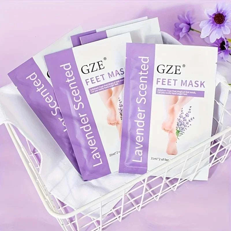 GZE Foot Peel Mask lavender scented exfoliating foot care packs in white and purple packaging in a white wire basket with purple flowers on a pink background