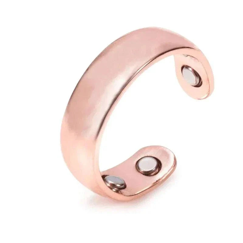 Rose gold anti snoring device ring with built-in bio-magnets for magnetic therapy and acupressure sleep aid.