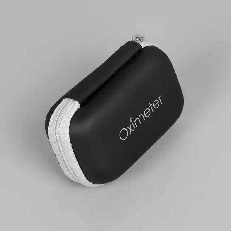 Compact black zippered case for storing medical devices, labeled "Oximeter"