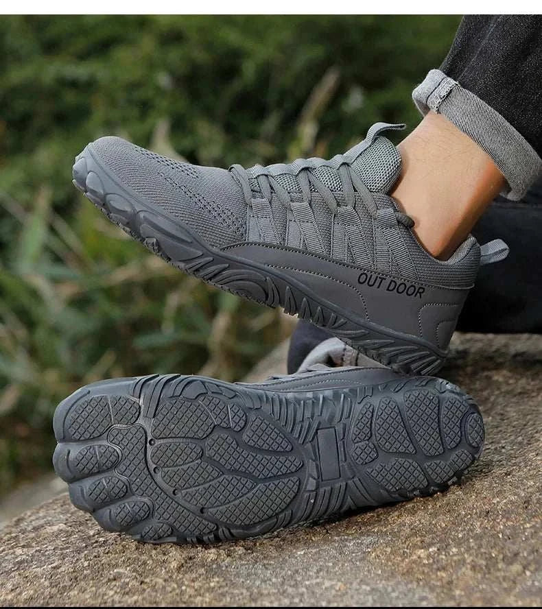 Gray new hiking shoes with breathable knit upper and durable traction sole designed for outdoor and casual use