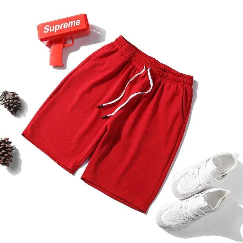 Red 2025 NEW Fitness Sports Shorts for men with elastic waistband and white drawstring, styled for athletic performance and comfort.