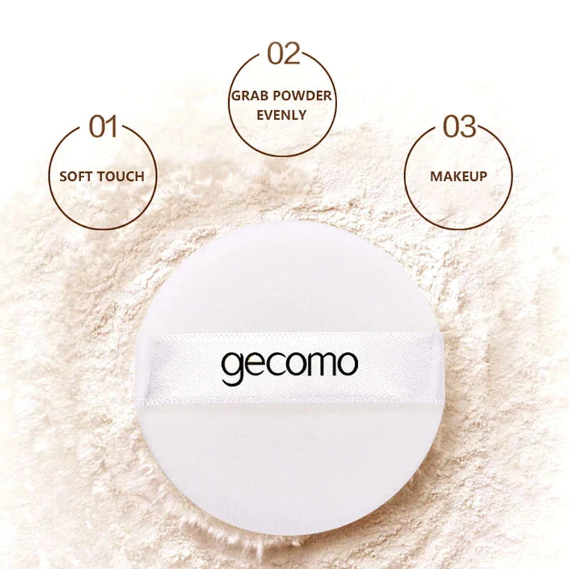 Gemeng Powder Makeup soft touch applicator on loose honey-toned setting powder for flawless, long-lasting finish