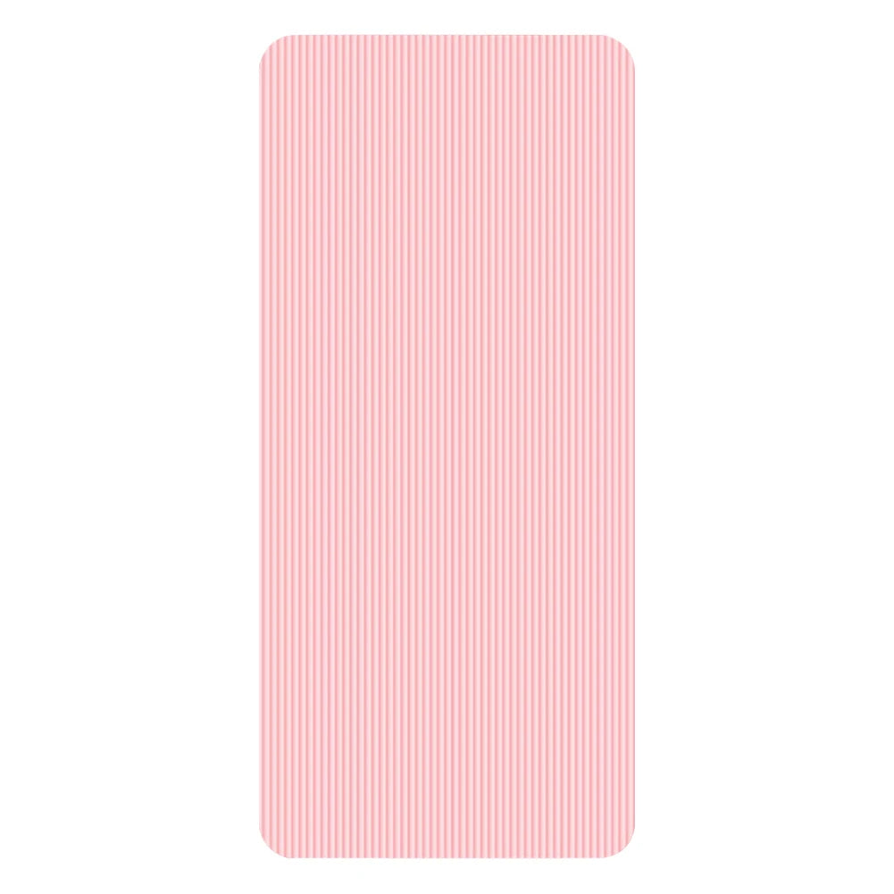Pink non-slip yoga mat with textured surface for grip and thick cushioning for comfort