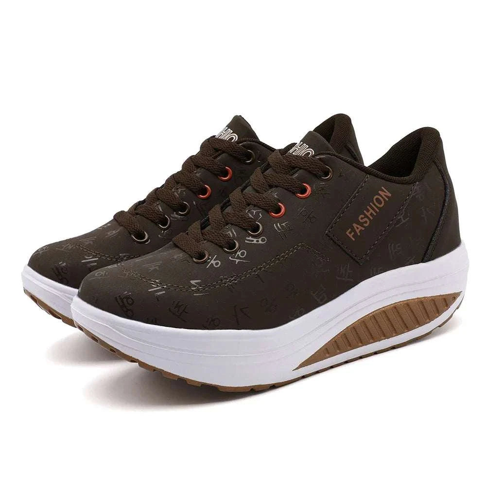 Breathable wedge heel sneakers with mesh upper, thick cushioned sole, lace-up closure, and lightweight design for women’s casual sportswear