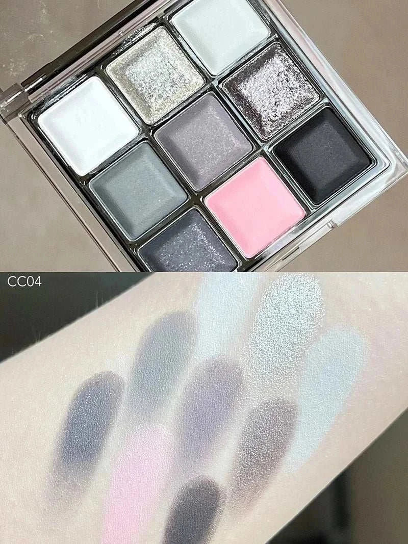 Black Pink Smoky Eye shadow palette with matte and pearlescent shades showing swatches on skin.