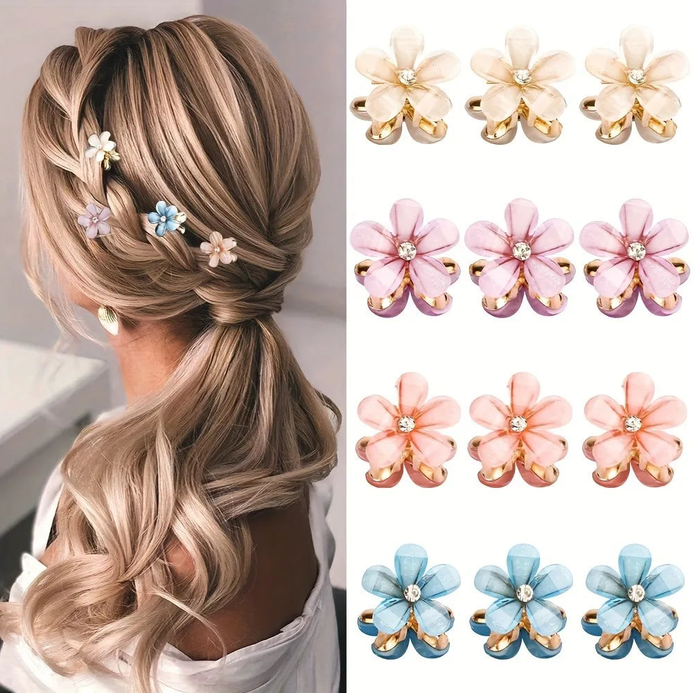 Flower shaped hair grab clips with faux pearl centers in pastel colors, styled in blonde hair, available in sets of various quantities