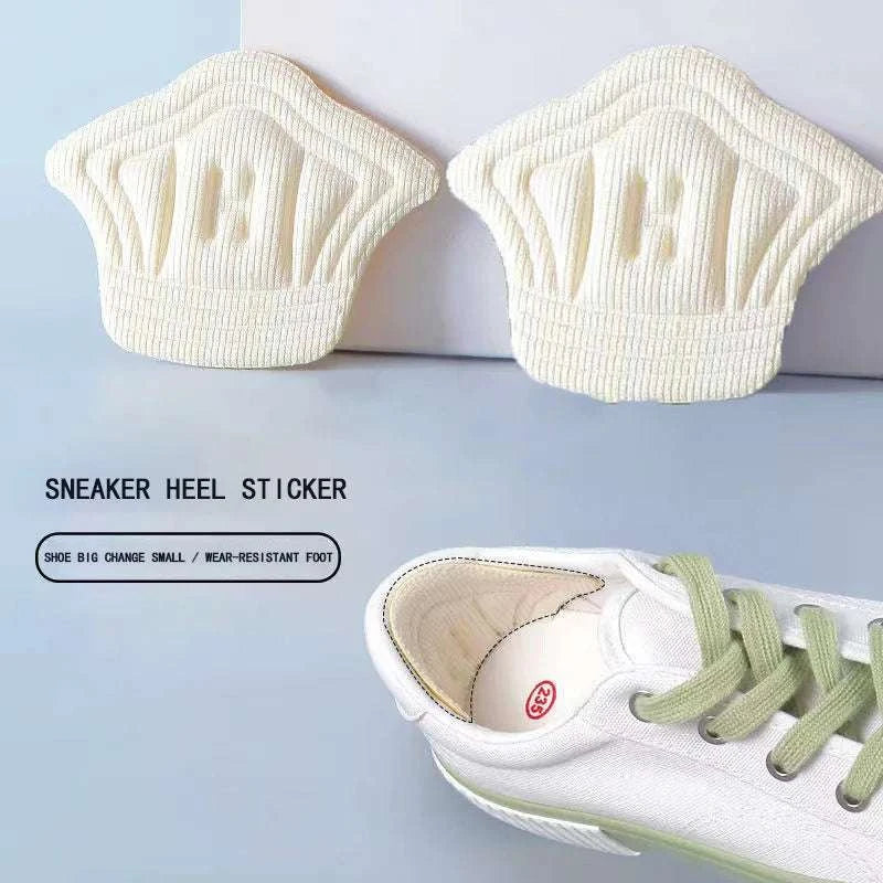 Pair of white heel cushion pads for sneaker heel protection and comfort with anti-wear design