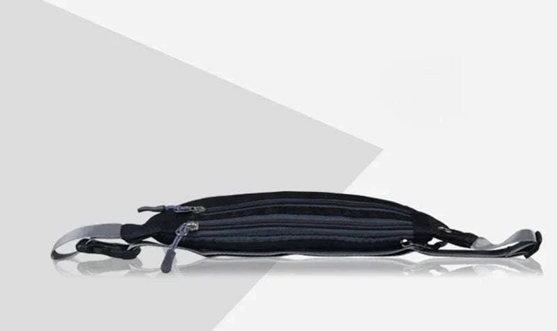 Slim black nylon waist and chest bag with multiple zippered compartments and adjustable straps for unisex use