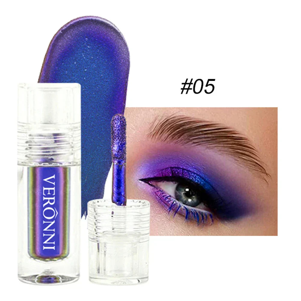 Chrome Shifting Chameleon Liquid Eyeshadow in vibrant purple with iridescent, multichrome finish shown in applicator bottle and applied on eye makeup.