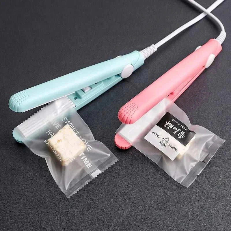 Portable mini flat iron in pastel blue and pink for travel hair styling