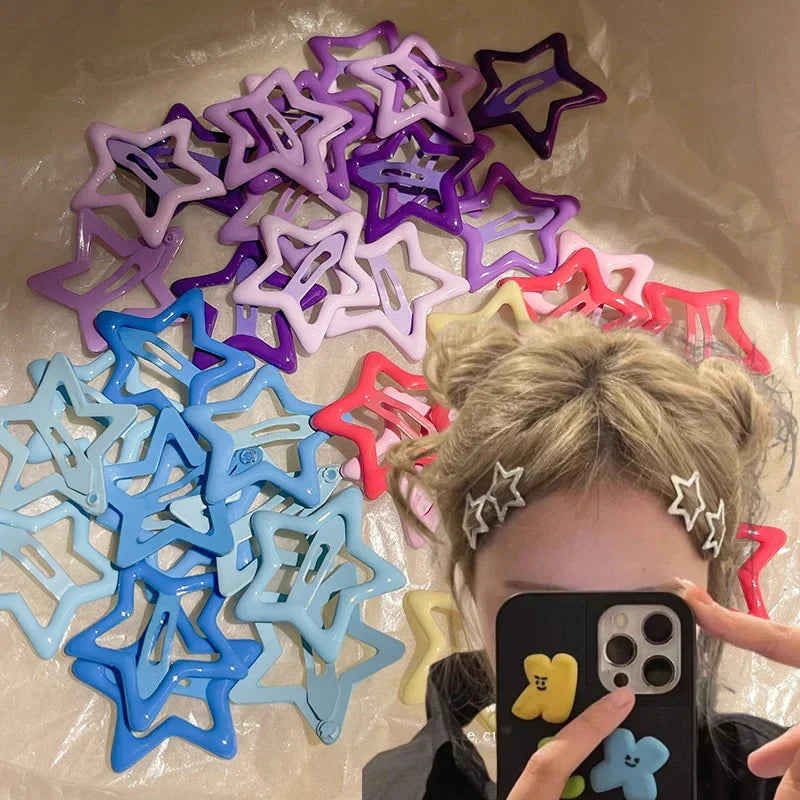 Colorful Kawaii Star Barrettes in pastel and bright shades clipped in hair and displayed on surface