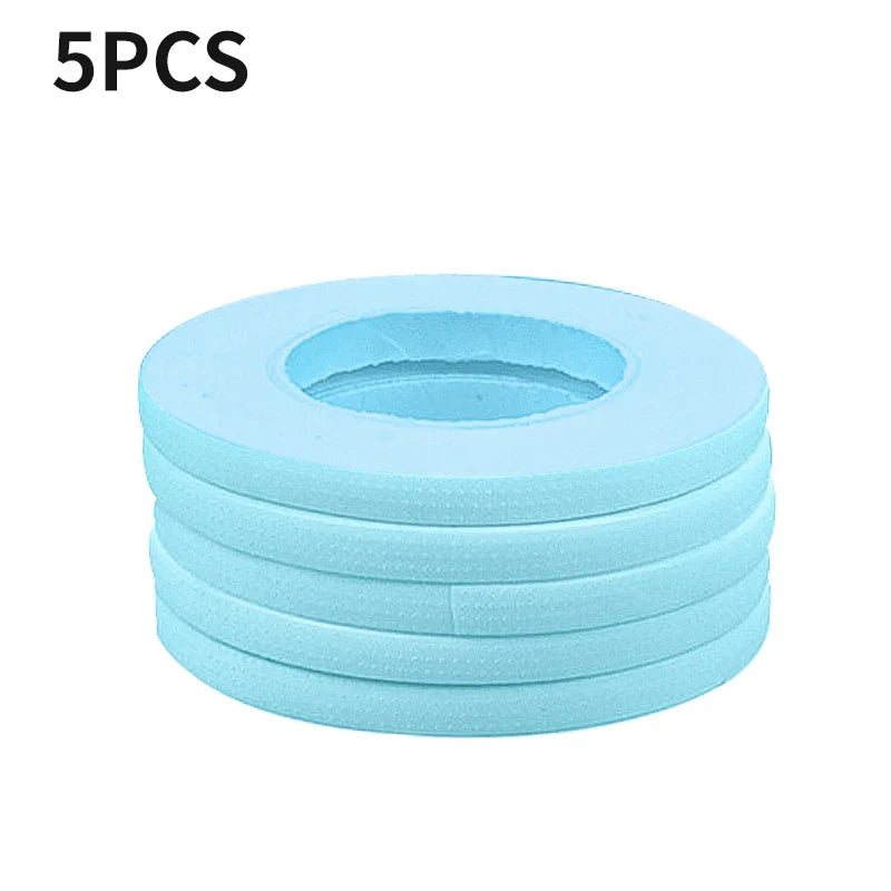 Stack of five blue micropore eyelash extension tapes for lower lash application
