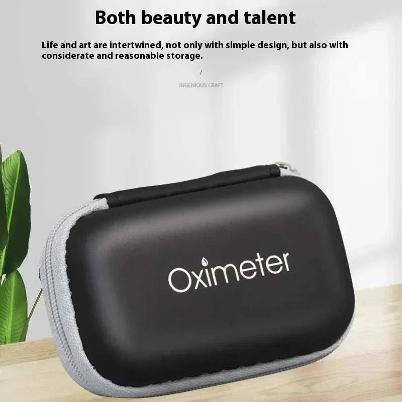 Portable black oximeter carrying case with zipper on wooden surface next to green plant