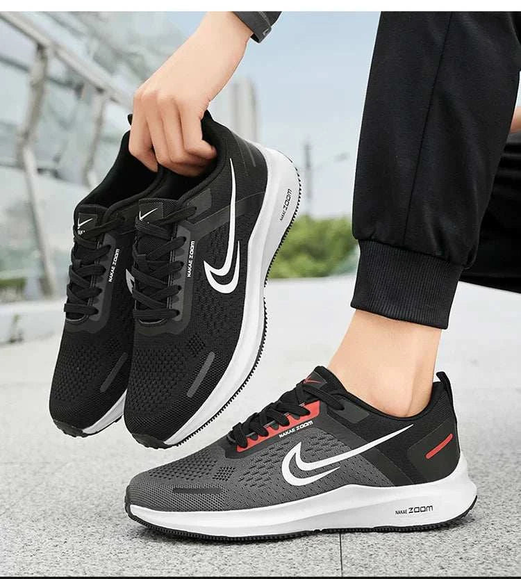 Men's lightweight running shoes with breathable mesh, cushioned memory foam insole, non-slip rubber outsole, and sporty sleek design.