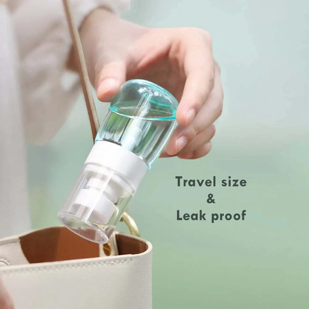 Compact 30ml mini travel spray bottle with fine mist, refillable, leak-proof, and travel-size for hair, face, sanitizer, and plants.