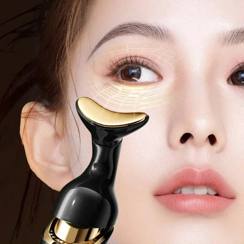 3-in-1 Face Massager gold and black microcurrent eye and facial beauty device on woman's face for anti-aging and skin rejuvenation